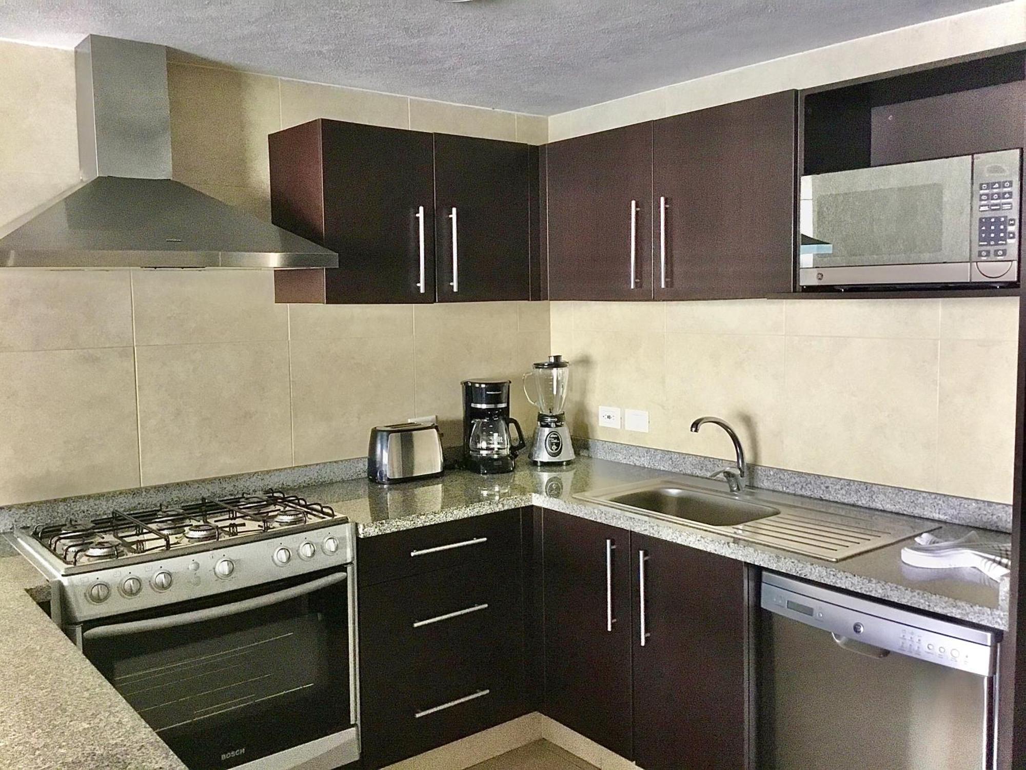 Apartamentos Grand Venetian Puerto Vallarta Rum bild